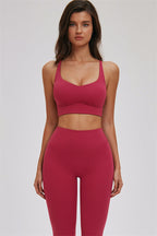 Fitglutes activewear sports bra and leggings set featuring a cross-back sports bra and matching workout leggings.