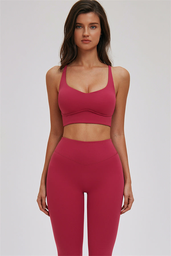 Fitglutes activewear sports bra and leggings set featuring a cross-back sports bra and matching workout leggings.