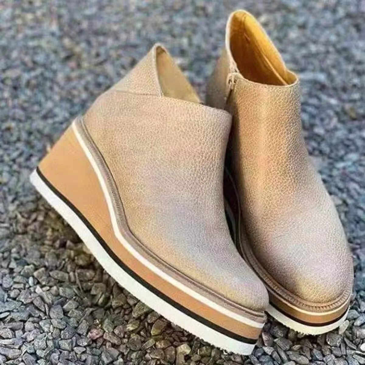 Women's ankle wedge boots with zipper from Trendsi, featuring a stylish design and comfortable wedge heel.