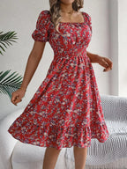 Shopimist ruffled hem floral puff sleeve dress featuring a feminine silhouette with ruffles and floral print.