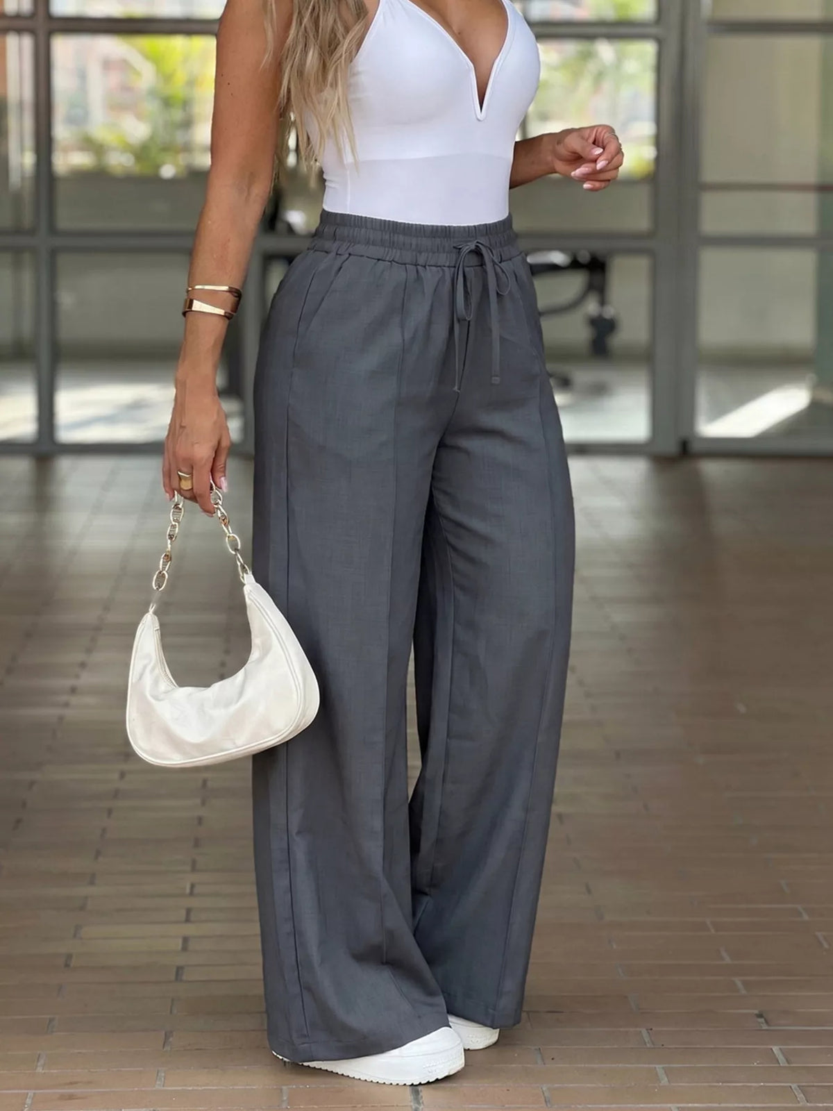Plush Fashion Hub high-waisted wide-leg drawstring pants in soft fabric, shown in a relaxed fit with a comfortable waistband.