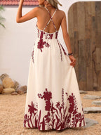 Elegant deep V-neck spaghetti strap evening maxi dress by Plush Fashion Hub, floor-length gown with a flowing silhouette.