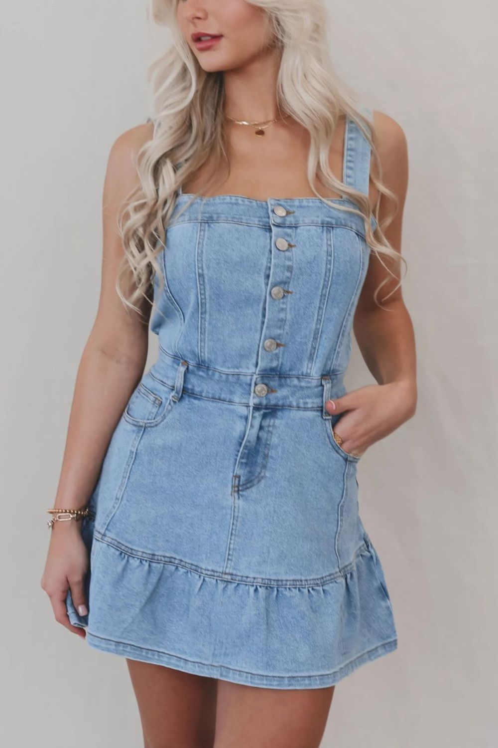 VYSN denim dress with ruffled hem, button front, and square neckline, showcasing casual and stylish fashion design.