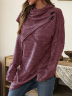 Asymmetrical hem cowl neck long sleeve T-shirt by Trendsi, featuring a stylish draped neckline and unique hem detail in soft fabric.