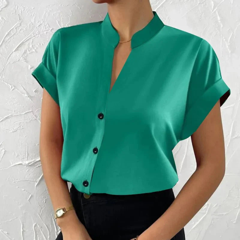 Light orange satin V-neck short sleeve shirt for women, casualwear by Plush Fashion Hub, shown flat on a white background.