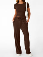 Women's round neck short sleeve T-shirt and drawstring lounge set, 2-piece set by Trendsi, casual and comfortable for relaxed wear.