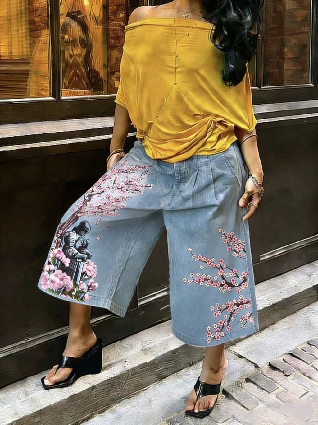 Women's wide-leg cargo pants by Plush Fashion Hub featuring zipper and button details, styled with pockets and relaxed fit.