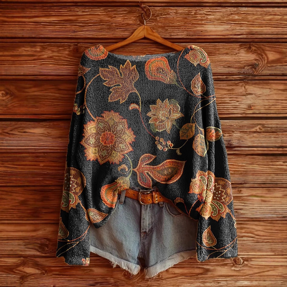 Women’s fall wildflower print long sleeve T-shirt from Plush Fashion Hub, featuring a colorful floral pattern on casual wear.