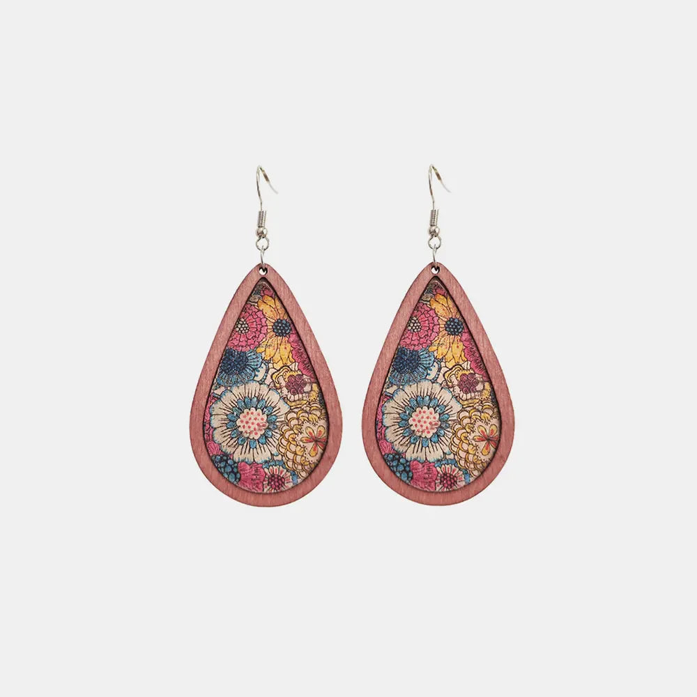 Floral wood teardrop earrings by Plush Fashion Hub featuring colorful flower patterns on wooden teardrop-shaped dangles.