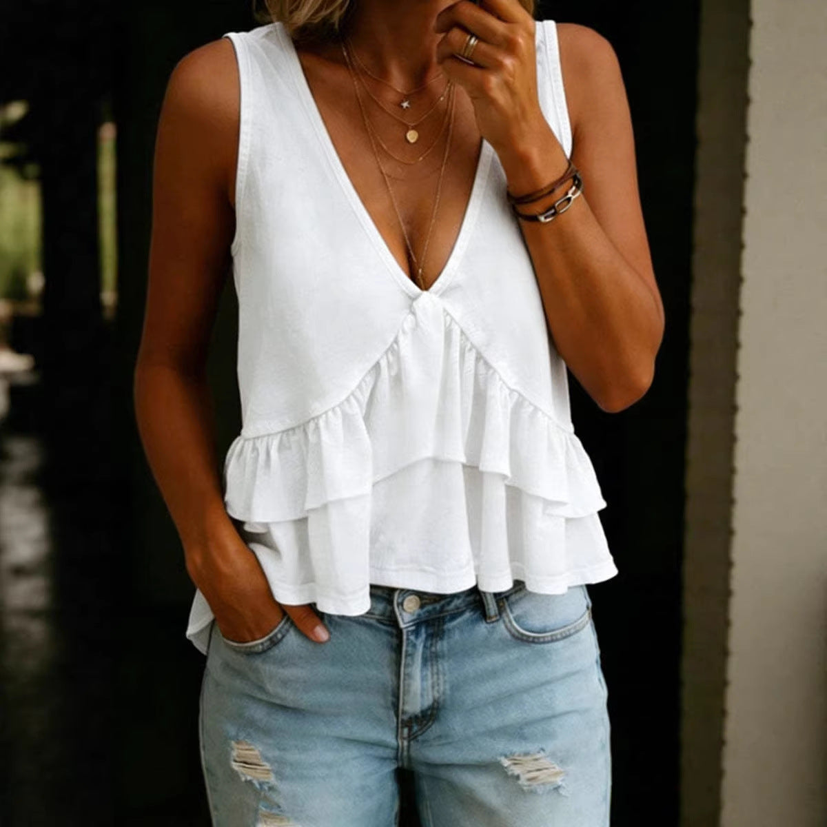 Plush Fashion Hub solid-colored V-neck sleeveless top with ruffled details, perfect for women's casual or stylish outfits.