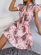 Dignified Flowers lace-up waist pleated maxi skirt by FitiqueFit, casualwear with floral pattern and flowing fabric.
