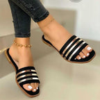 Women's open-toe striped flat sandals by Plush Fashion Hub, featuring comfortable PU leather and summer-ready design.