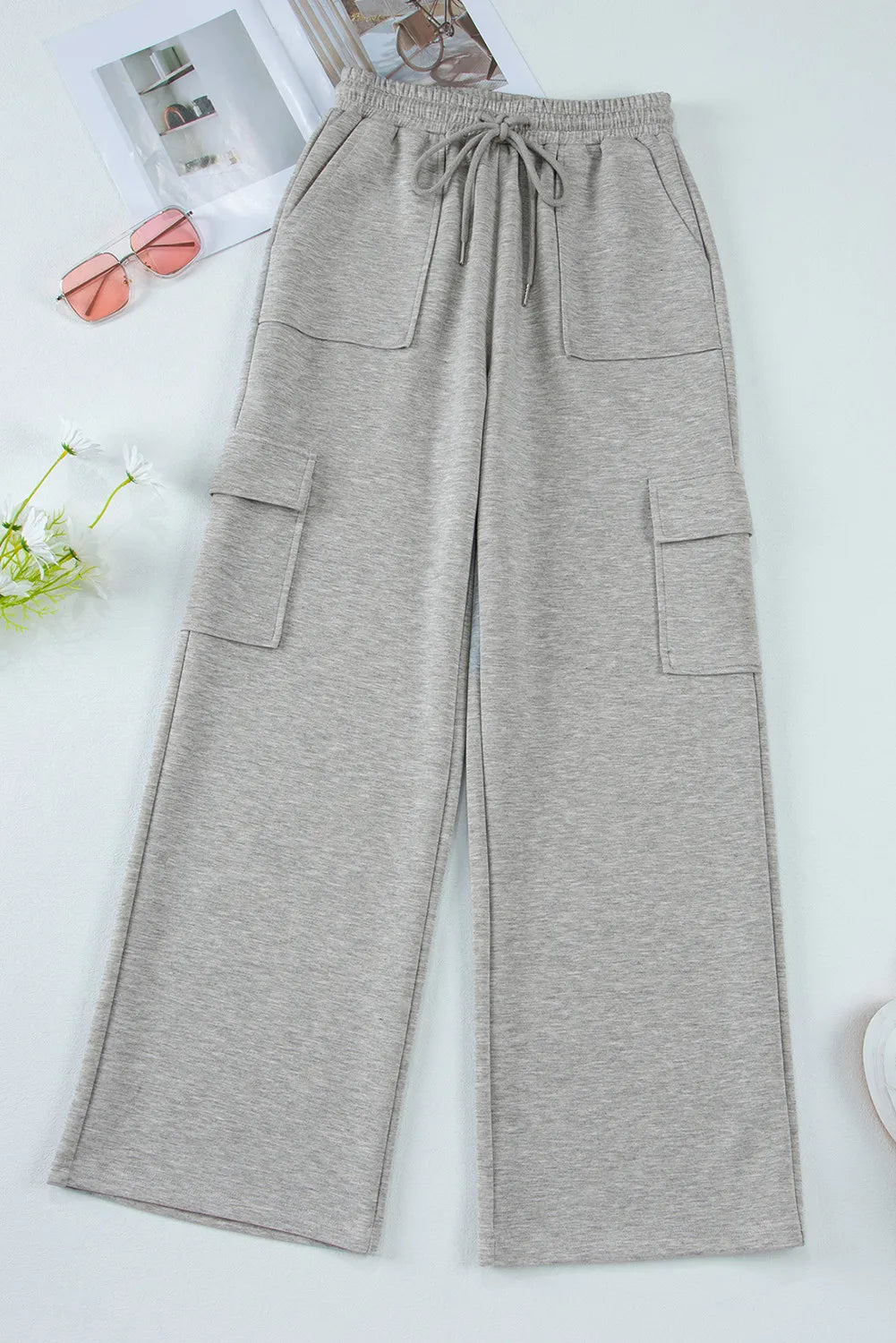 Plush Fashion Hub plush drawstring active pants with pockets, comfortable athletic pants for casual wear and workouts.