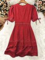 Shopimist lace detail v-neck mini dress with elegant design and flowing fabric, perfect for stylish occasions.