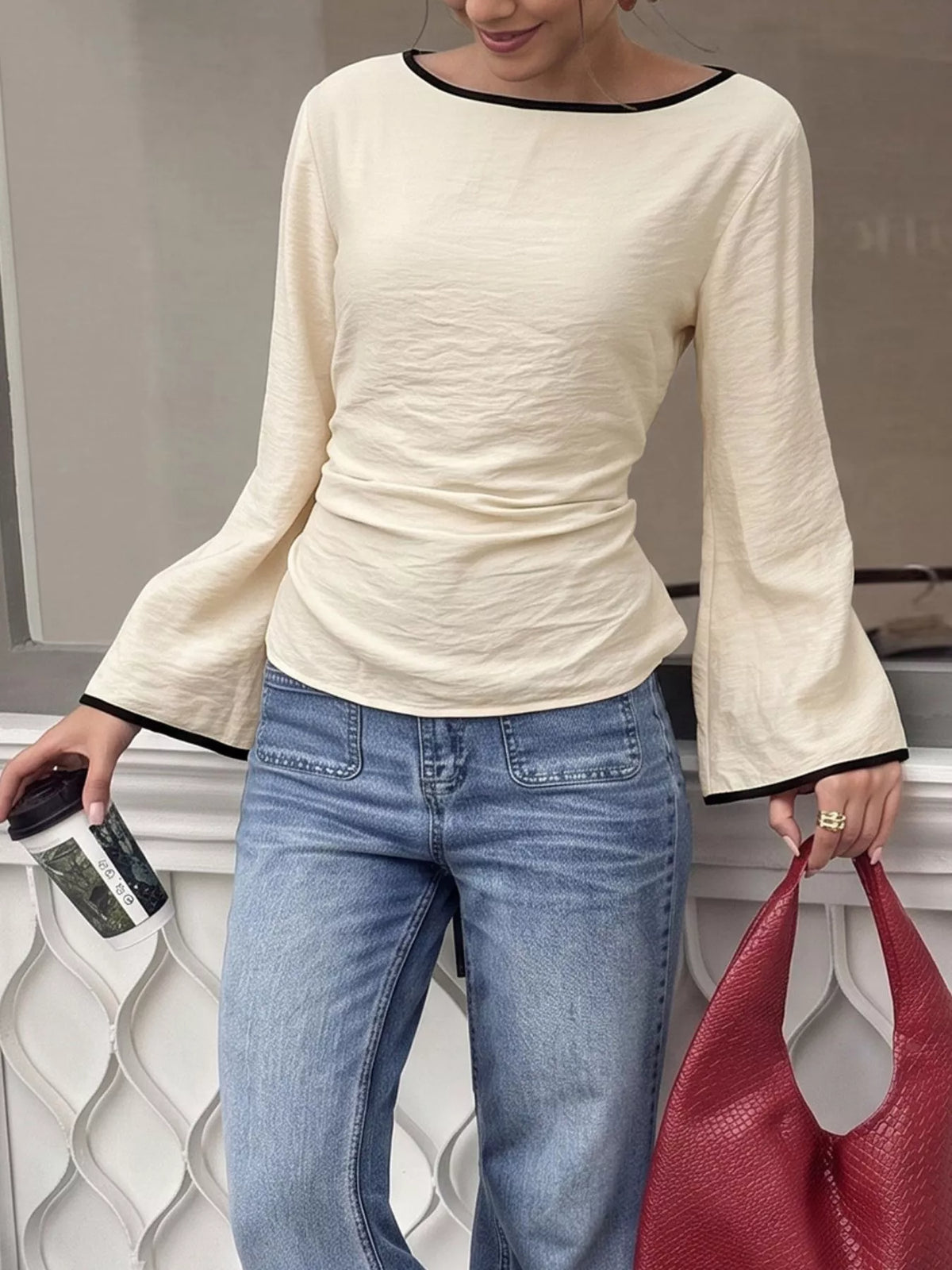 Contrast trim flare sleeve blouse by Plush Fashion Hub featuring a stylish design with flared sleeves and a tailored fit.