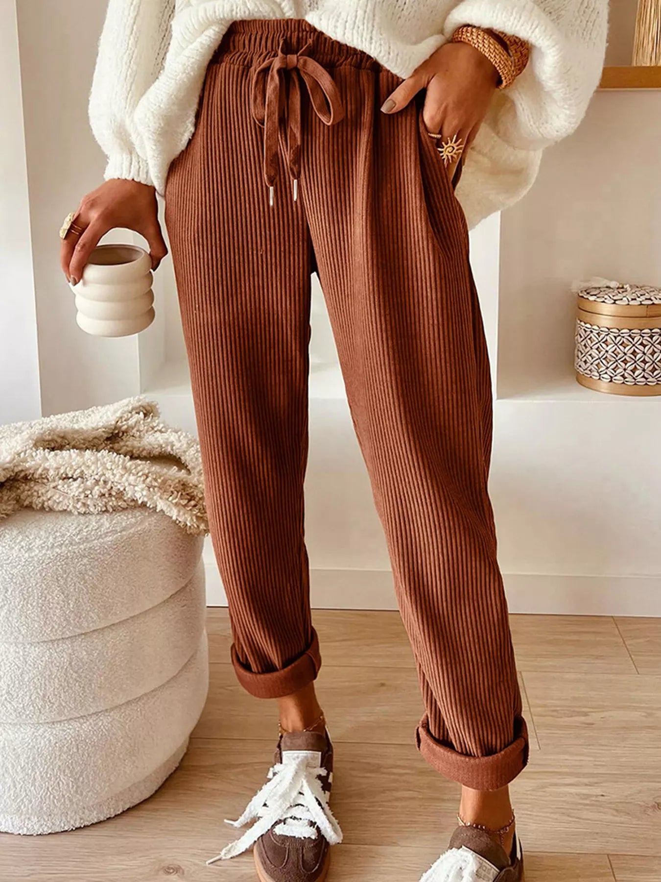 Plush Fashion Hub casual corduroy drawstring waist pants with rings, shown in a relaxed fit on a model.