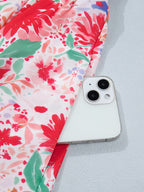 Floral print tie-shoulder midi dress with pockets, lightweight summer dress by Trendsi, featuring a flowy silhouette and vibrant floral pattern.