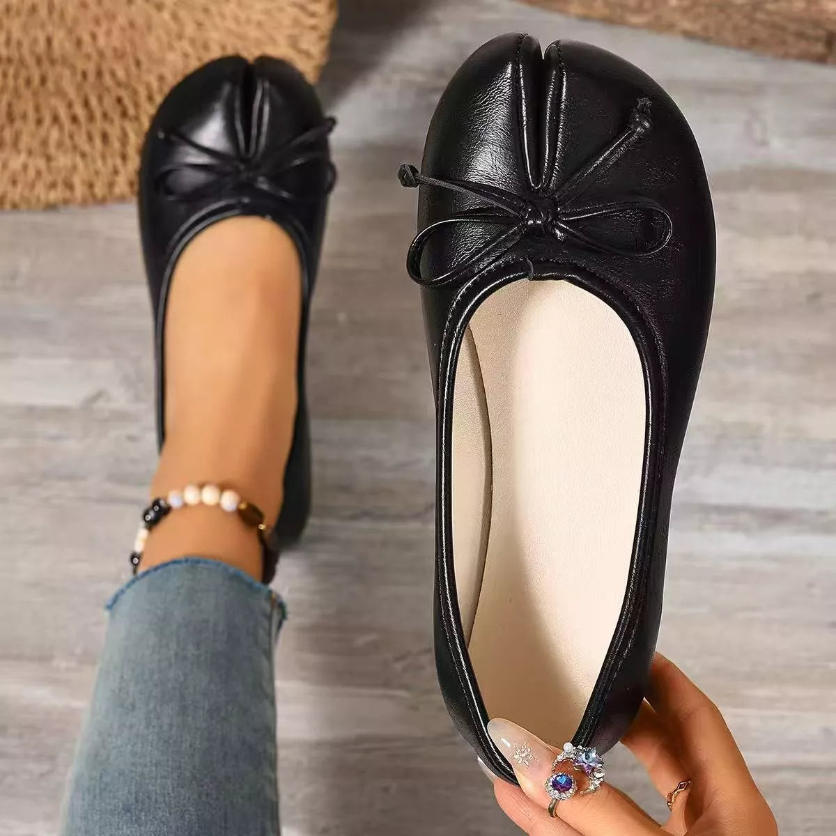 Trendsi Bow Decor Split Toe Slip-On Shoes featuring a stylish bow accent and comfortable slip-on design.