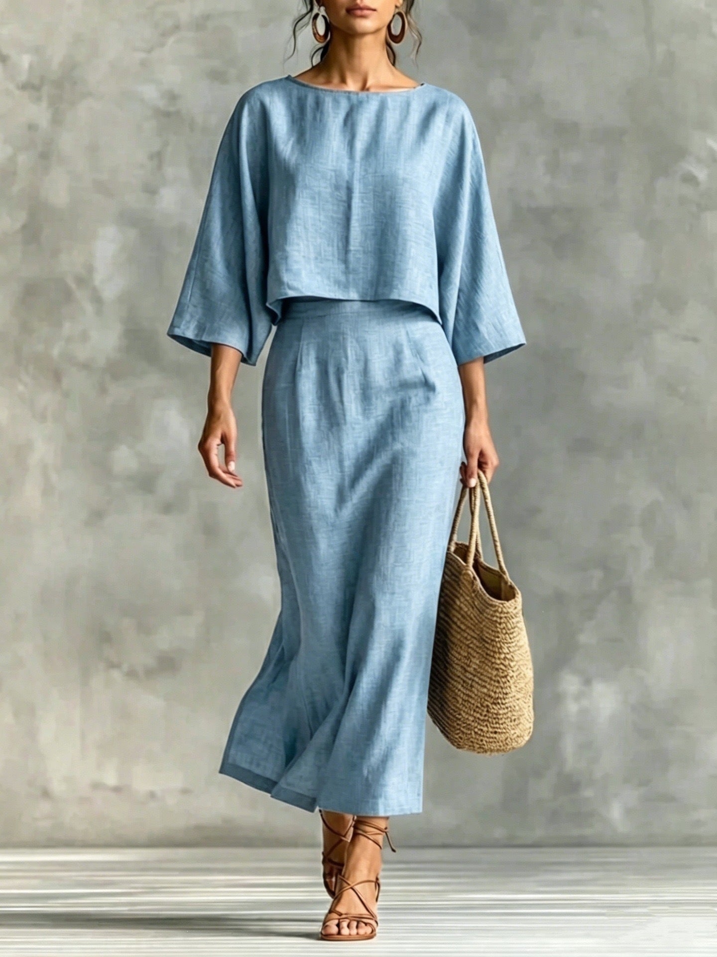 Casualwear set with a high waist long skirt and 3/4 sleeve loose top by Plush Fashion Hub, displayed on a mannequin.