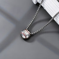 Sterling silver baseball pendant necklace with charm, featuring a detailed baseball design on a sleek chain.