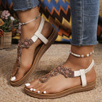 Bohemian rhinestone beaded thong sandals by Trendsi with elastic ankle strap and flat sole, perfect for stylish summer wear.