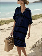 Plus size women's striped half-sleeve midi dress by Plush Fashion Hub, casual chic everyday wear, showing front view and relaxed fit.