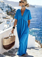 V-neck short-sleeve high waist maxi dress by FitiqueFit, featuring a flowing resort style design and elegant silhouette.