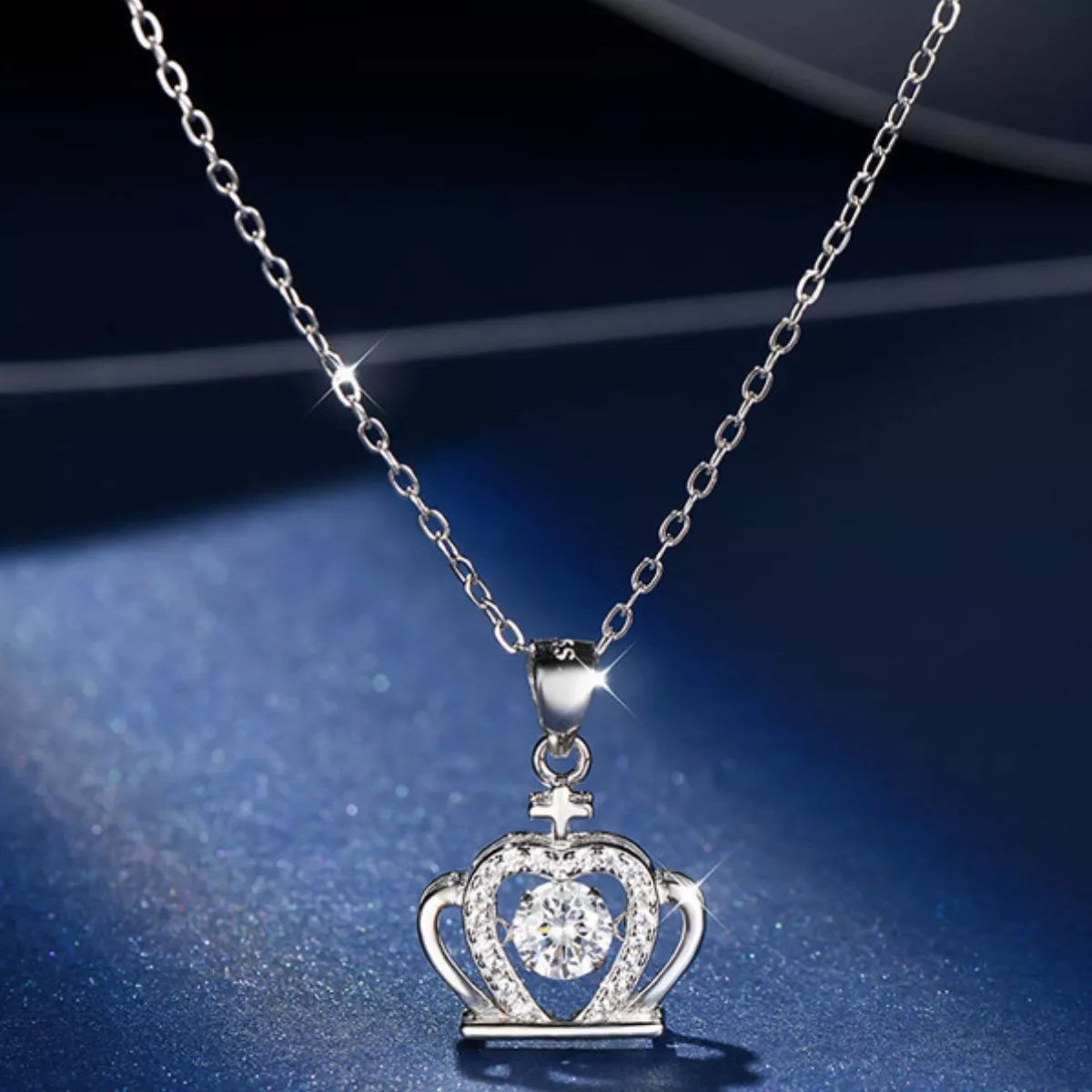 925 Sterling Silver Zircon Crown Pendant Necklace featuring a detailed crown design with sparkling zircon stones.