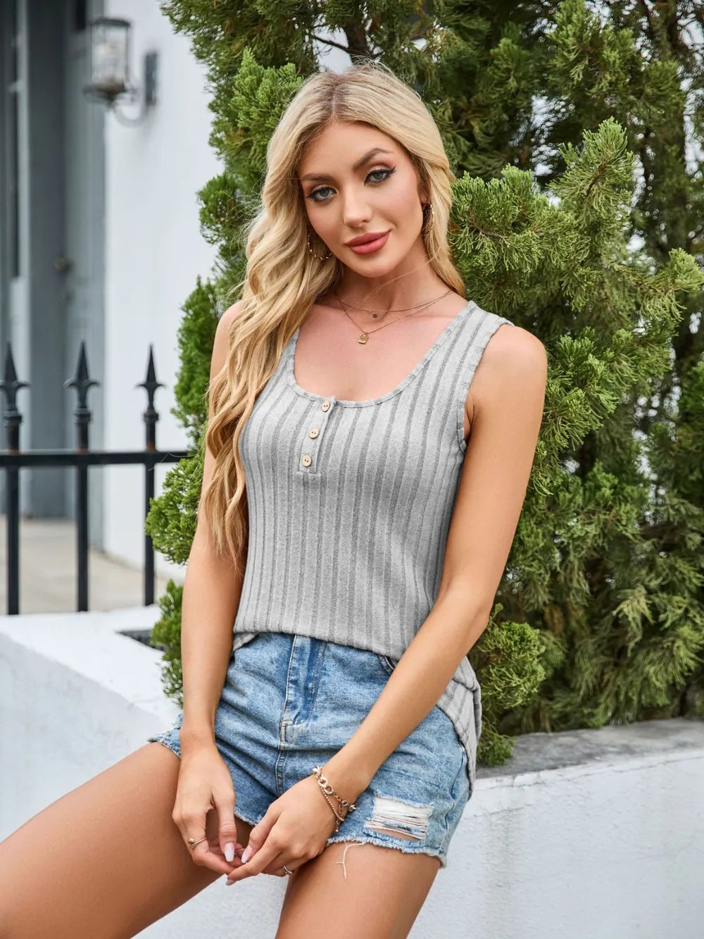White scoop neck wide strap tank top from Trendsi, featuring a fitted sleeveless design and comfortable wide shoulder straps.