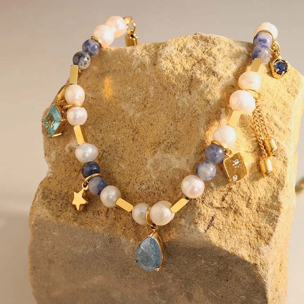 18K gold-plated beaded charm necklace with delicate beads and small charm pendant, stylish jewelry by Plush Fashion Hub.