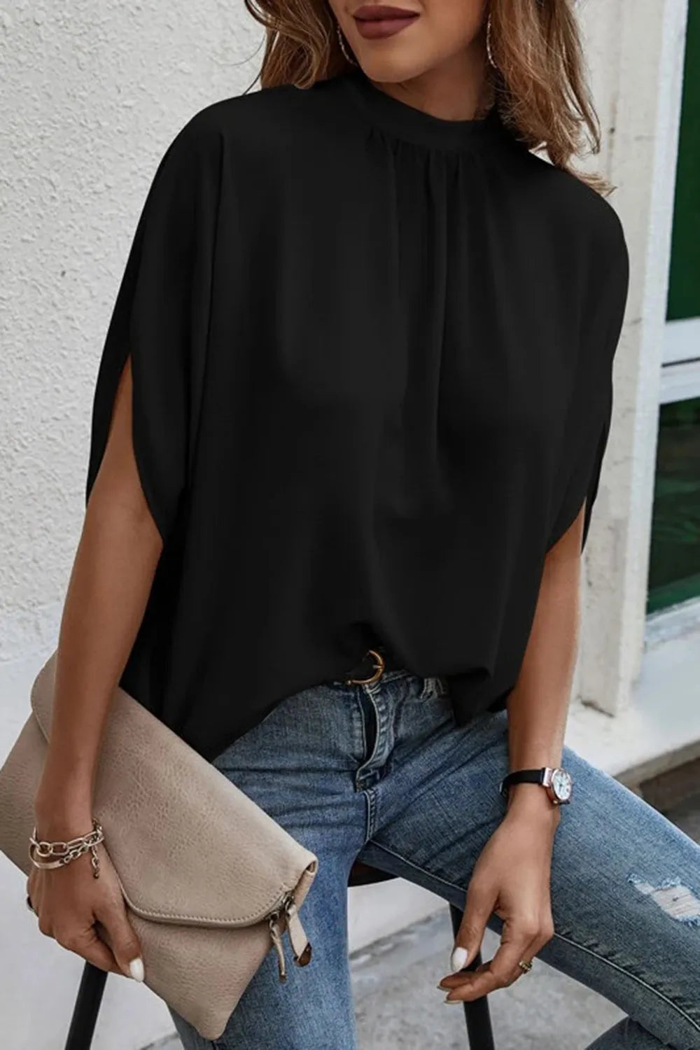 Plush Fashion Hub elegant tie-back half-sleeve blouse with side slit, showcasing soft fabric and stylish design.
