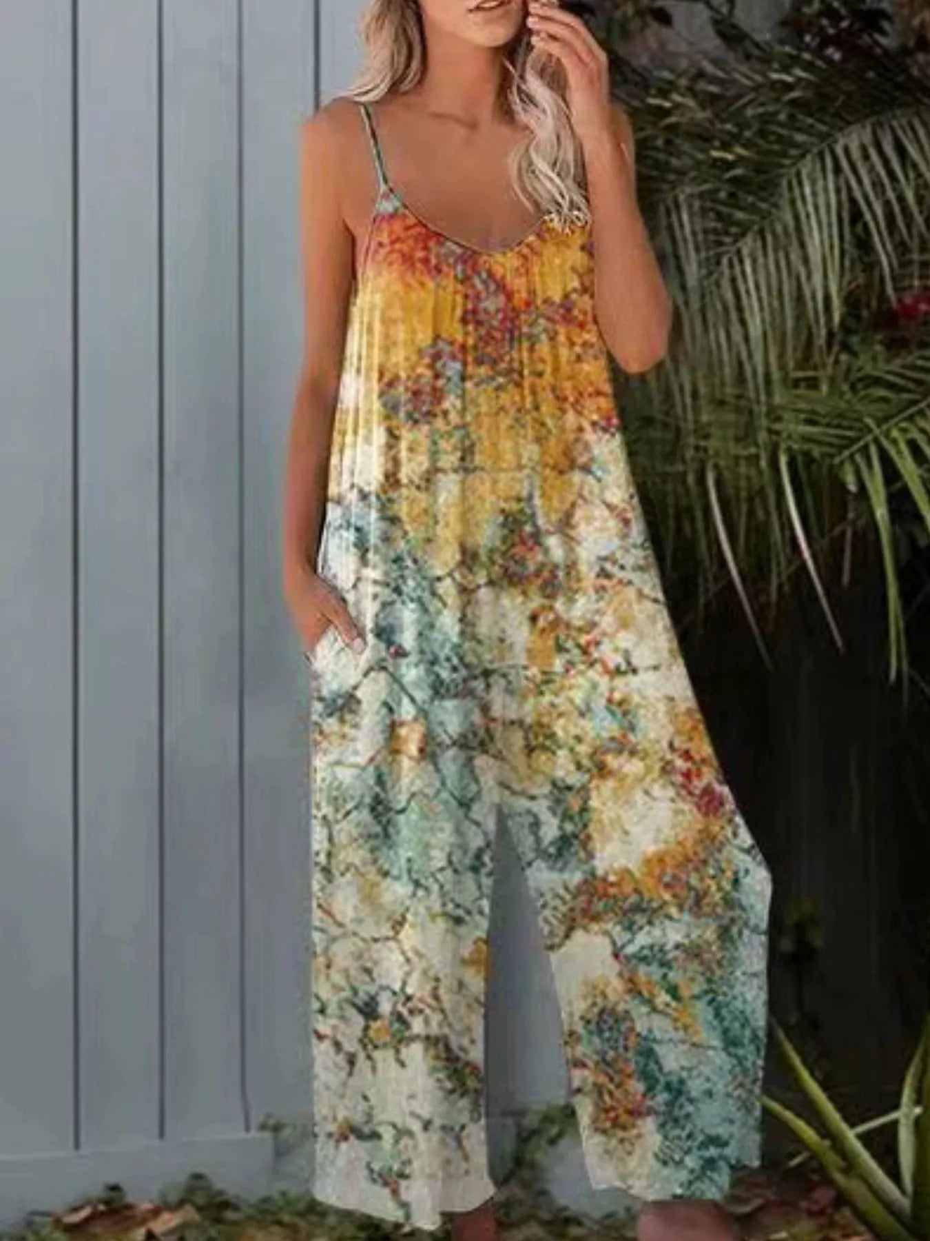 Full size Shopimist tie-dye wide leg jumpsuit featuring a relaxed fit and vibrant colorful pattern, perfect for casual wear.