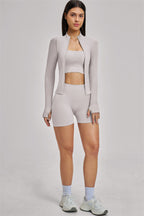 Fitglutes Activewear The Vision Jacket sports bra and shorts 3-piece set, shown in black, perfect for gym workouts and activewear.
