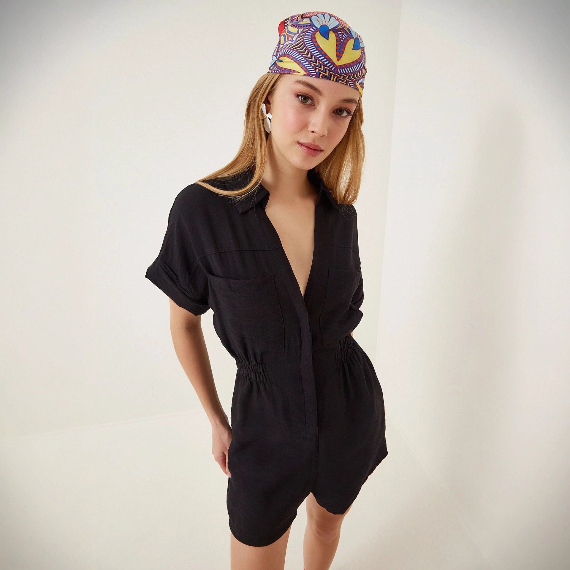Women's cotton linen loose-fit workwear jumpsuit with pockets, featuring a relaxed style and lightweight fabric by FitiqueFit.