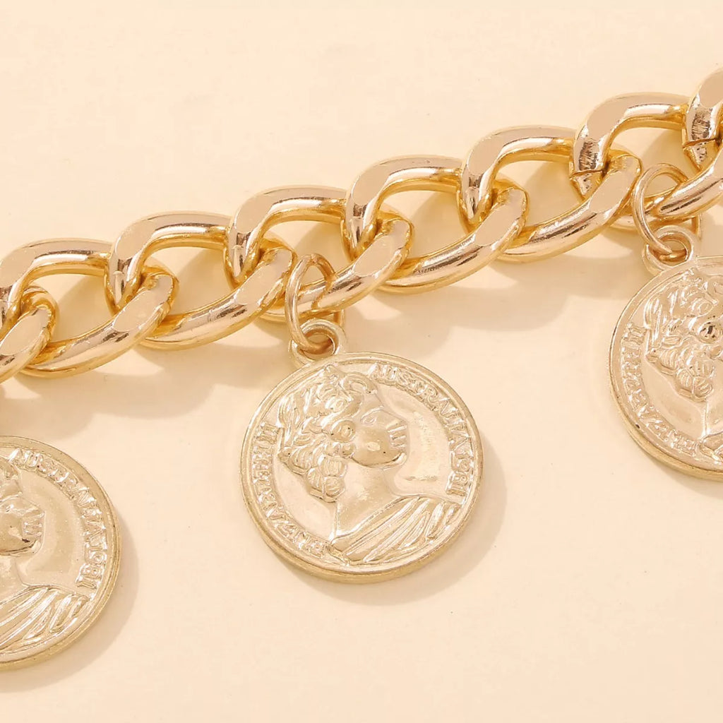 18K gold-plated coin charm bracelet with intricate coin details and adjustable chain, stylish jewelry accessory.