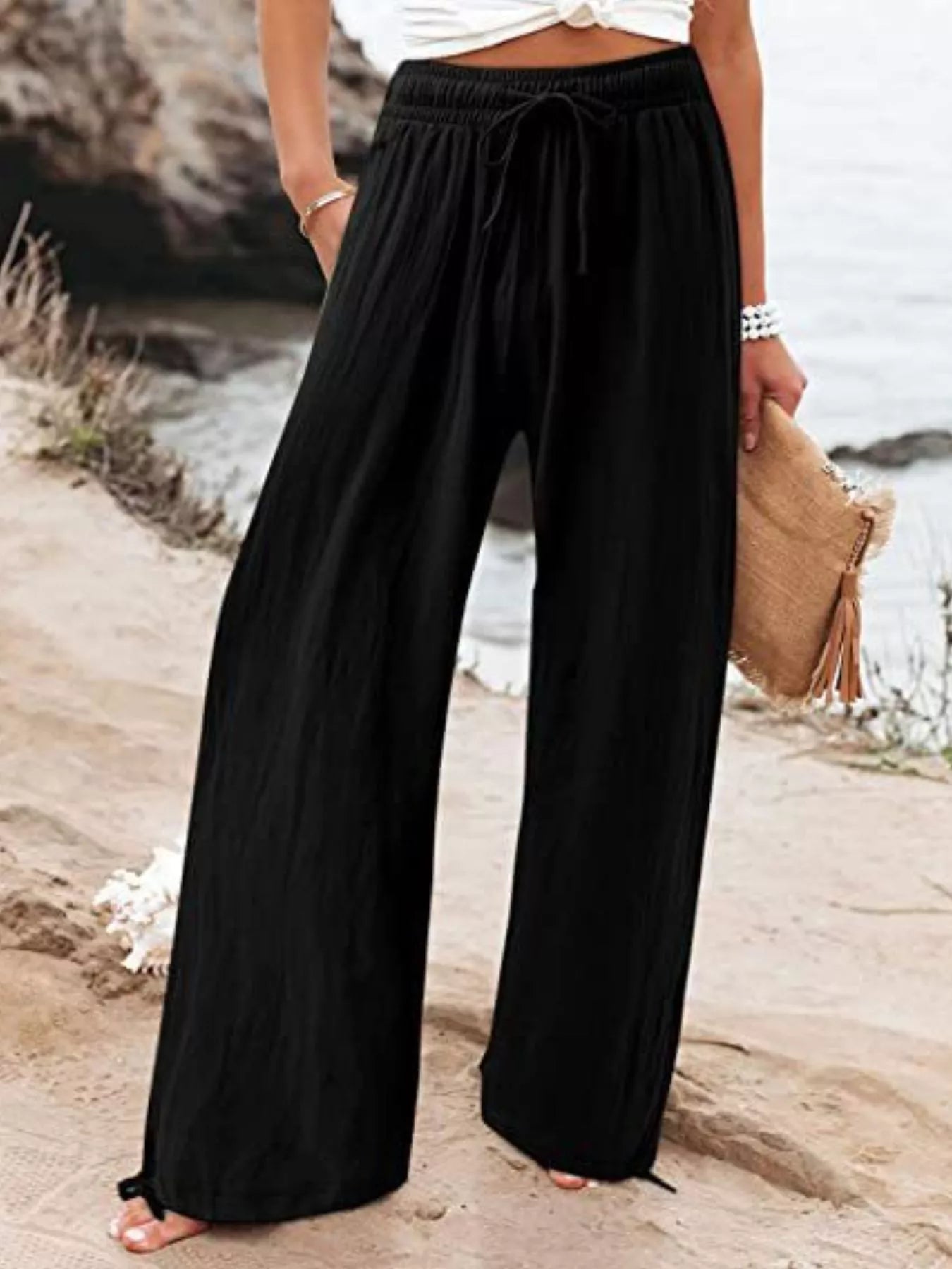 Plus size full size wide leg pants with drawstring waist from Shopimist, featuring a flowy fit and comfortable design.