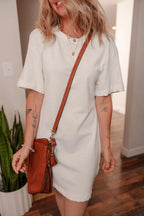 Women's cotton drop shoulder crew neck shift T-shirt dress by Trendsi, shown in a relaxed fit with short sleeves and casual style.