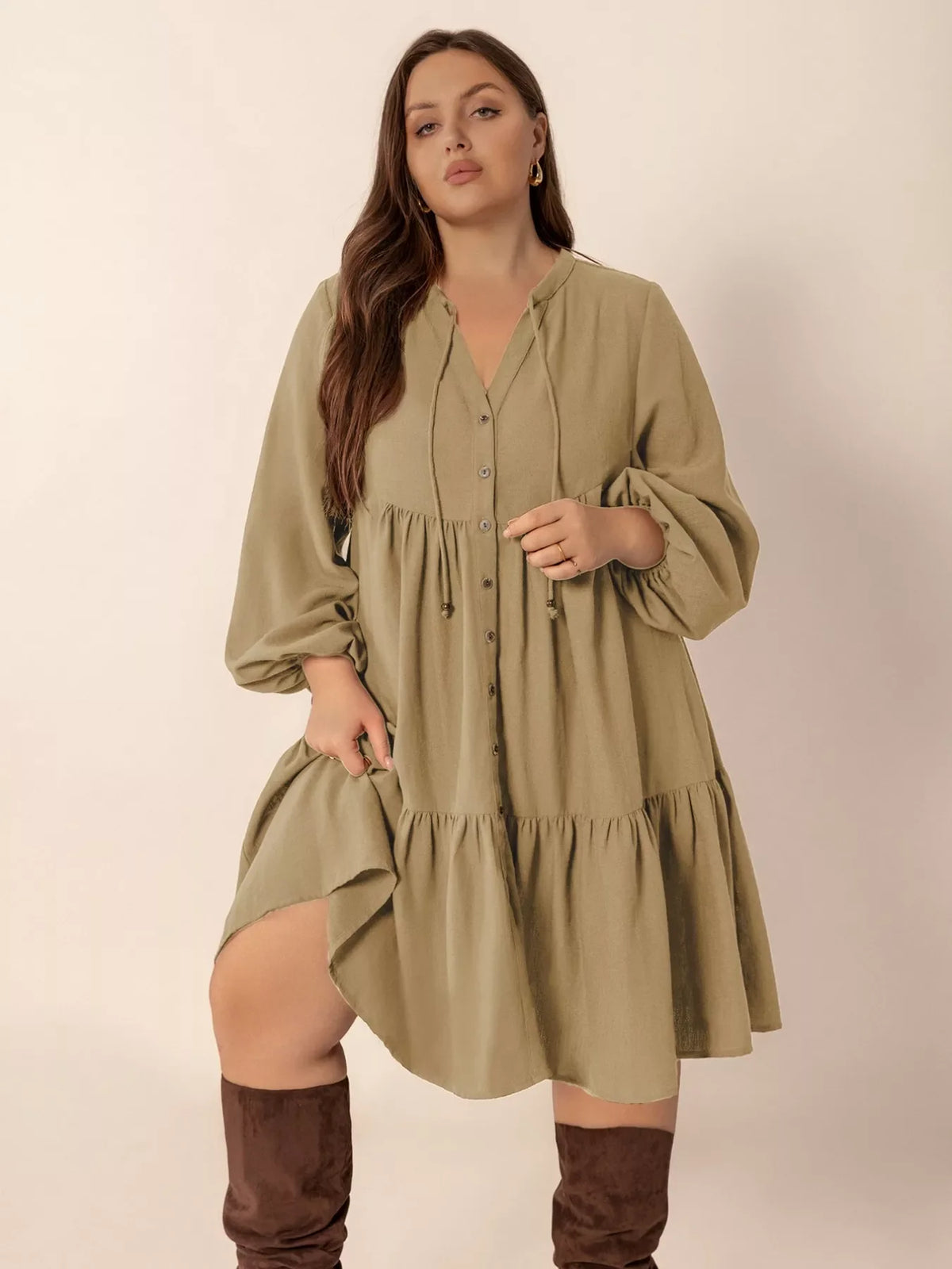 Plus size tie neck balloon sleeve dress from Plush Fashion Hub, featuring a stylish tie neckline and voluminous sleeves.