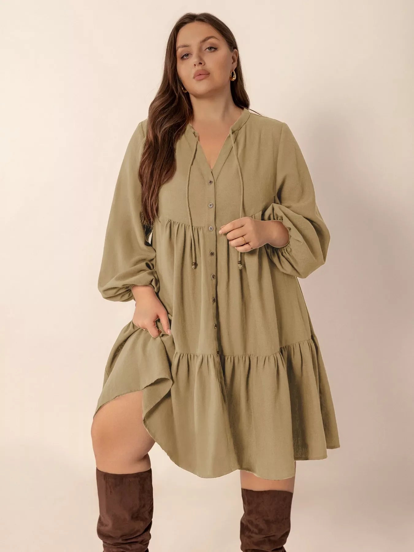 Plus size tie neck balloon sleeve dress from Plush Fashion Hub, featuring a stylish tie neckline and voluminous sleeves.