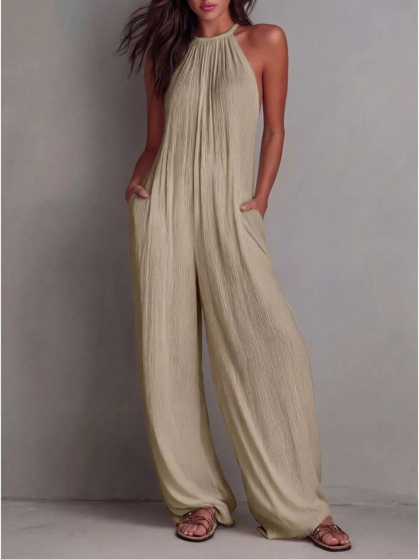 Sleeveless wide-leg jumpsuit by Shopimist featuring a relaxed fit, strapless design, and flowy fabric in a stylish silhouette.