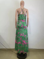 Printed halter neck maxi dress by Shopimist with vibrant floral pattern, flowing fabric, and elegant design for summer wear.