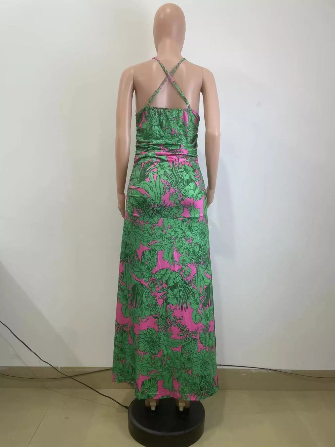 Printed halter neck maxi dress by Shopimist with vibrant floral pattern, flowing fabric, and elegant design for summer wear.