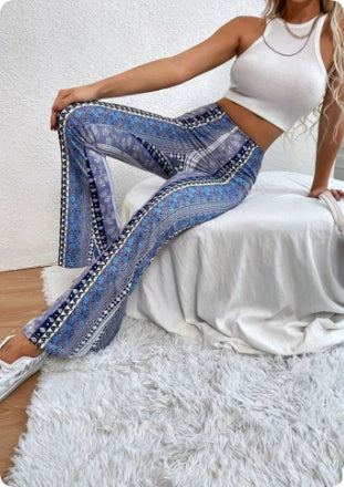 High elastic slim print trousers for women, showcasing fitted, sexy design with bold patterns from Plush Fashion Hub.