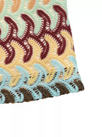 Crochet drawstring mini skirt by Trendsi featuring a textured design, lightweight fabric, and adjustable waist for a stylish look.