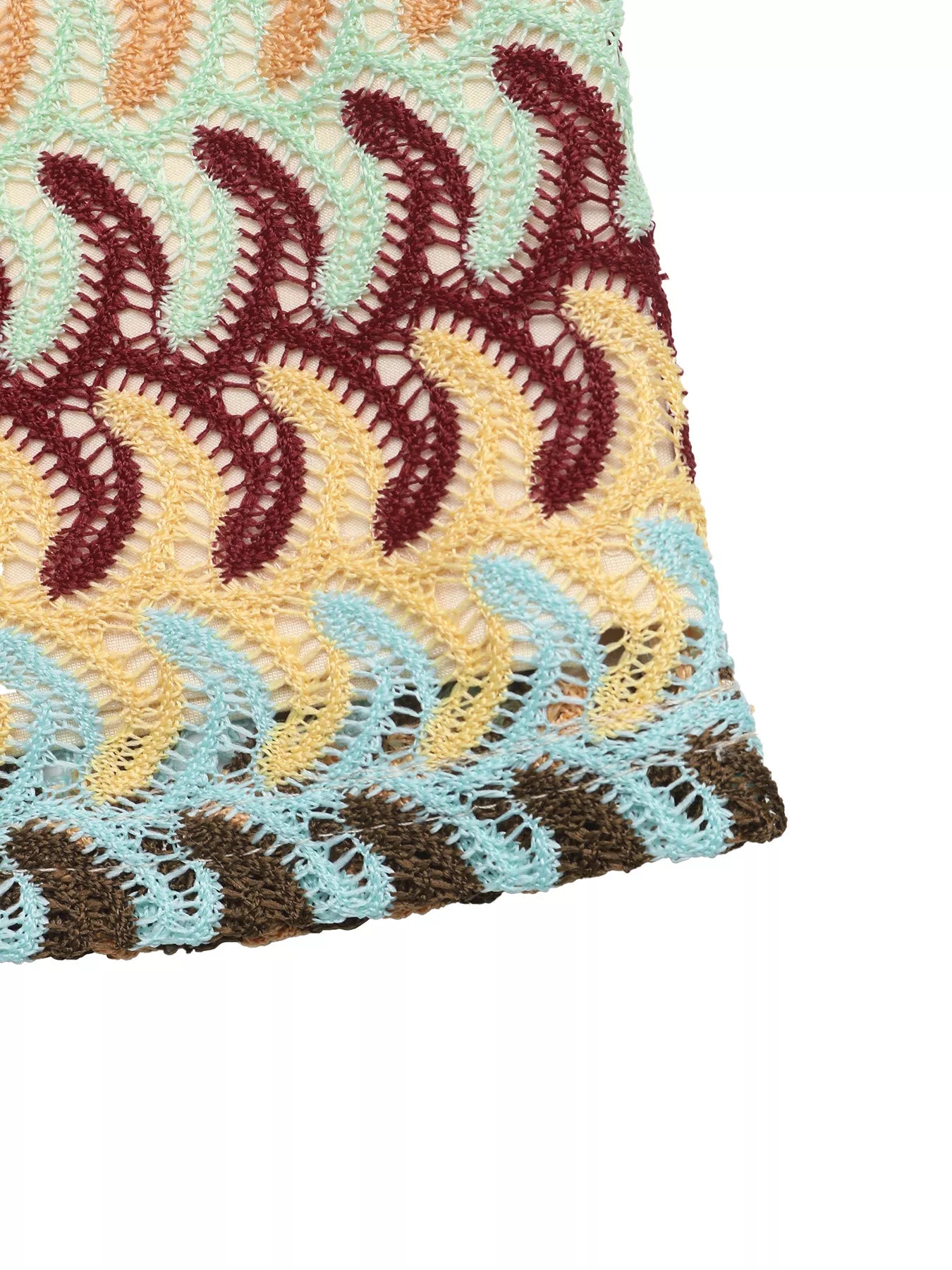 Crochet drawstring mini skirt by Trendsi featuring a textured design, lightweight fabric, and adjustable waist for a stylish look.