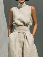 Shopimist sleeveless turtleneck top and matching pants set, featuring a sleek, fitted design in a neutral color.