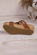 Sara Leather Wedge Platform Slippers by Threaded Pear showing beige leather slippers with wedge soles and slip-on design.