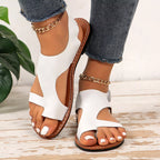 Leather toe loop flats sandals from Shopimist featuring sleek design and comfortable leather straps.