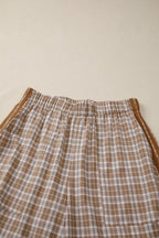 Plaid print casual pants with tie detail from Plush Fashion Hub, featuring a relaxed fit and stylish plaid pattern.