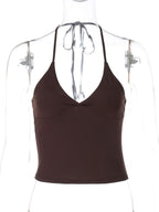 Women's halter neck slim fit cami top by Trendsi, sleeveless stretch tank with a fitted silhouette and stylish neckline.